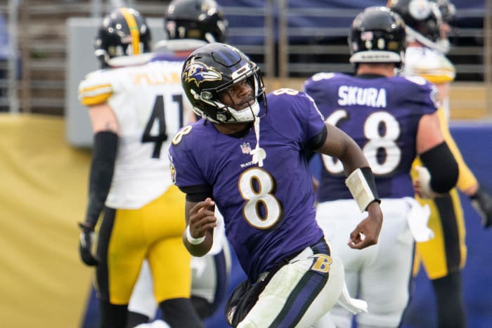Nov 1, 2020; Baltimore, Maryland, USA; Baltimore Ravens quarterback Lamar Jackson (8) reacts after throwing a second half touchdown against the Pittsburgh Steelers at M&T Bank Stadium.